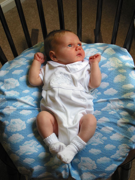 Age: 1 month Lying in the rocking chair that Richard's mother rocked him in as a child.